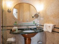a bathroom with a sink and a mirror at The Pucic Palace in Dubrovnik