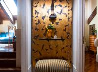 a living room with a wall with birds on it at The Pucic Palace in Dubrovnik