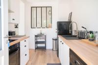 Kuchnia lub aneks kuchenny w obiekcie Villa Nina- Maison cocon cosy