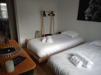 Łóżko lub łóżka w pokoju w obiekcie Villa Nina- Maison cocon cosy