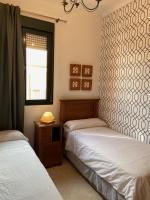 Postel nebo postele na pokoji v ubytování Torneo Atico Premium Apartment