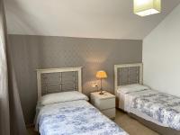 Postel nebo postele na pokoji v ubytování Torneo Atico Premium Apartment
