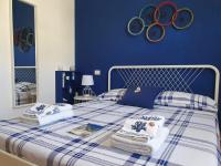 A bed or beds in a room at Spazioso appartamento con terrazza a due passi dal centro