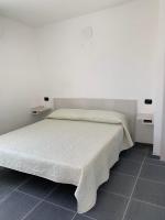 Posteľ alebo postele v izbe v ubytovaní Camping Village Torrenova