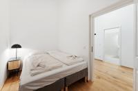 Posteľ alebo postele v izbe v ubytovaní Center Wien designer central modern apartment