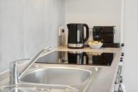 Kuchyňa alebo kuchynka v ubytovaní Center Wien designer central modern apartment