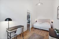 Posteľ alebo postele v izbe v ubytovaní Center Wien designer central modern apartment