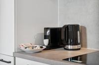 Príslušenstvo na prípravu kávy alebo čaju v ubytovaní Center Wien designer central modern apartment