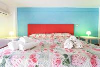 A bed or beds in a room at Casa Azzurra