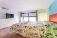 A bed or beds in a room at Casa Azzurra