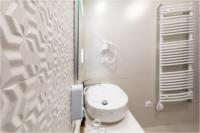 Łazienka w obiekcie Hotel Szatmári & Étterem Jászberény