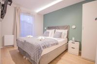 Posteľ alebo postele v izbe v ubytovaní InPoint Central Suites with Parking Available