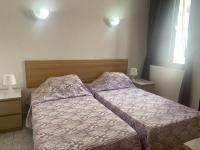 Postel nebo postele na pokoji v ubytování Apartment 5A1, Victoria Court 1, Avenida Londres 6, Los Cristianos, 38650, Tenerife