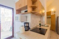 a kitchen with a sink and a counter top at Apartments with a parking space Karigador, Novigrad - 2534 in Karigador