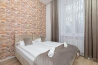 Posteľ alebo postele v izbe v ubytovaní Beautiful Apartments Kraków Dietla by Noclegi Renters