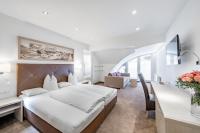 Posteľ alebo postele v izbe v ubytovaní Hotel Garni Christine