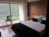 Postel nebo postele na pokoji v ubytování Hotel Eco Salvador