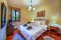 Posteľ alebo postele v izbe v ubytovaní Livadi cozy villa