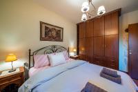 Posteľ alebo postele v izbe v ubytovaní Livadi cozy villa