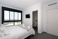 Posteľ alebo postele v izbe v ubytovaní CH Villa Skyline La Marquesa Golf (Ciudad Quesada)