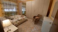 Posteľ alebo postele v izbe v ubytovaní Cleo & Sanso Apartment