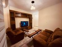 Posezení v ubytování Modern entire apartment in the heart of Sheikh Zayed city