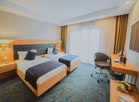 Postel nebo postele na pokoji v ubytování Sera Nature Hotel & Spa
