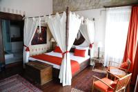 A bed or beds in a room at Zen Alacati Hotel