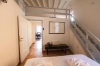 A bed or beds in a room at Artsy and elegant apartment near Pantheon