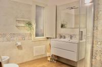 Kúpeľňa v ubytovaní Home Viale Trento 16