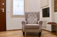 Televízia a/alebo spoločenská miestnosť v ubytovaní Home Viale Trento 16