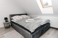 Postel nebo postele na pokoji v ubytování APARTAMENT KARO 2 Karkonosze