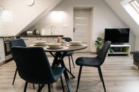 TV a/nebo společenská místnost v ubytování APARTAMENT KARO 2 Karkonosze