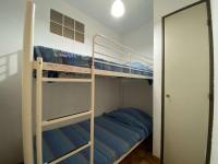 a bunk bed room with two bunk beds in it at Appartement Sainte-Maxime, 2 pièces, 4 personnes - FR-1-226-500 in Sainte-Maxime