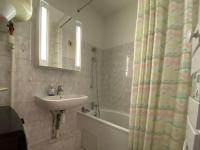 a bathroom with a sink and a shower curtain at Appartement Sainte-Maxime, 2 pièces, 4 personnes - FR-1-226-500 in Sainte-Maxime