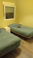 Postel nebo postele na pokoji v ubytování Apartamento, dos dormitorios, tipo ático cerca del centro
