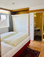 Posteľ alebo postele v izbe v ubytovaní Hotel Sonnenhof - bed & breakfast & appartements