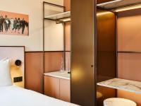 Łóżko lub łóżka w pokoju w obiekcie TRIBE Hôtel Le Touquet