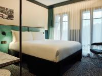 Łóżko lub łóżka w pokoju w obiekcie TRIBE Hôtel Le Touquet
