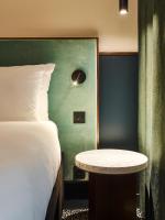 Łóżko lub łóżka w pokoju w obiekcie TRIBE Hôtel Le Touquet