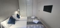 Postel nebo postele na pokoji v ubytování Apartament MAG