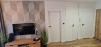 TV a/nebo společenská místnost v ubytování Apartament MAG