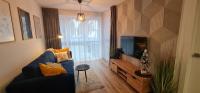 TV a/nebo společenská místnost v ubytování Apartament MAG