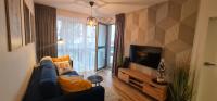 TV a/nebo společenská místnost v ubytování Apartament MAG