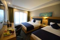 Postel nebo postele na pokoji v ubytování Sera Nature Hotel & Spa