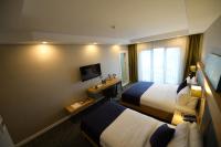 TV a/nebo společenská místnost v ubytování Sera Nature Hotel & Spa