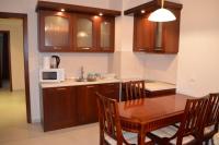 Kuchyň nebo kuchyňský kout v ubytování Elinor Apartment - Downtown