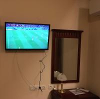 TV a/nebo společenská místnost v ubytování Elinor Apartment - Downtown