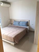 Postel nebo postele na pokoji v ubytování Chaweng Beach Apartment 1 Schlafzi-1Wohnzi-Pool-Fitnes