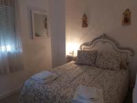 Posteľ alebo postele v izbe v ubytovaní Casa Rural "La Casita"